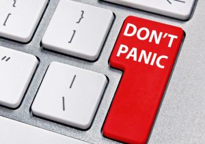 red key on keyboard says don't panic