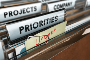 file folder labels saying urger, priorities, projects